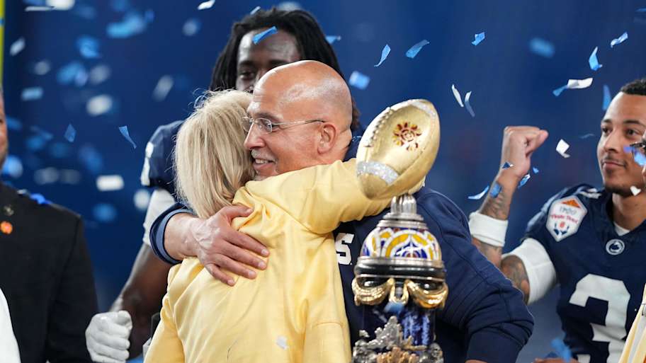 Penn State Nittany Lions head coach James Franklin reacts with the trophy after defeating the Boise State Broncos in the Fiesta Bowl at State Farm Stadium.  | Joe Camporeale-Imagn Images